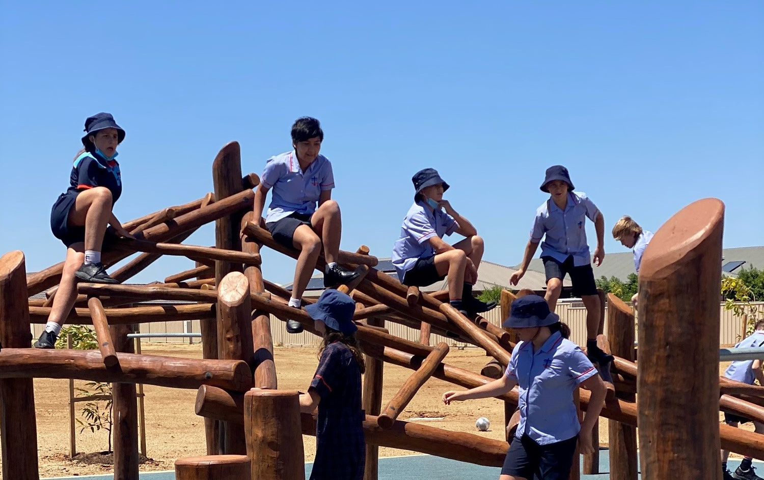 Students on play equipment_1.jpg